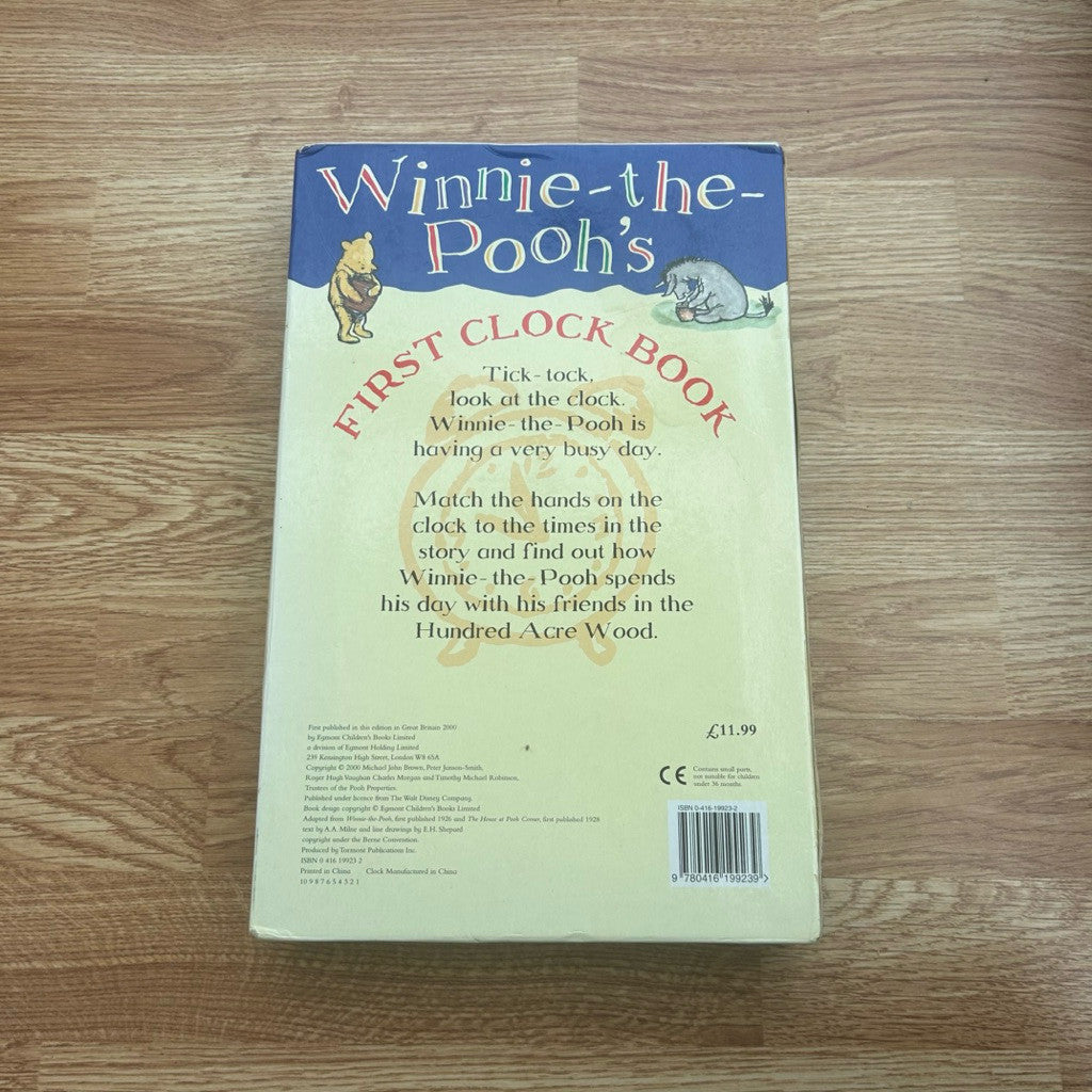 Hardcover The World of Winnie The Pooh's First Clock Book by A.A. Milne