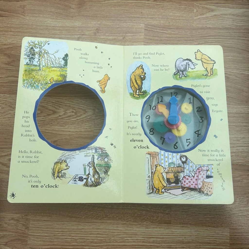 Hardcover The World of Winnie The Pooh's First Clock Book by A.A. Milne
